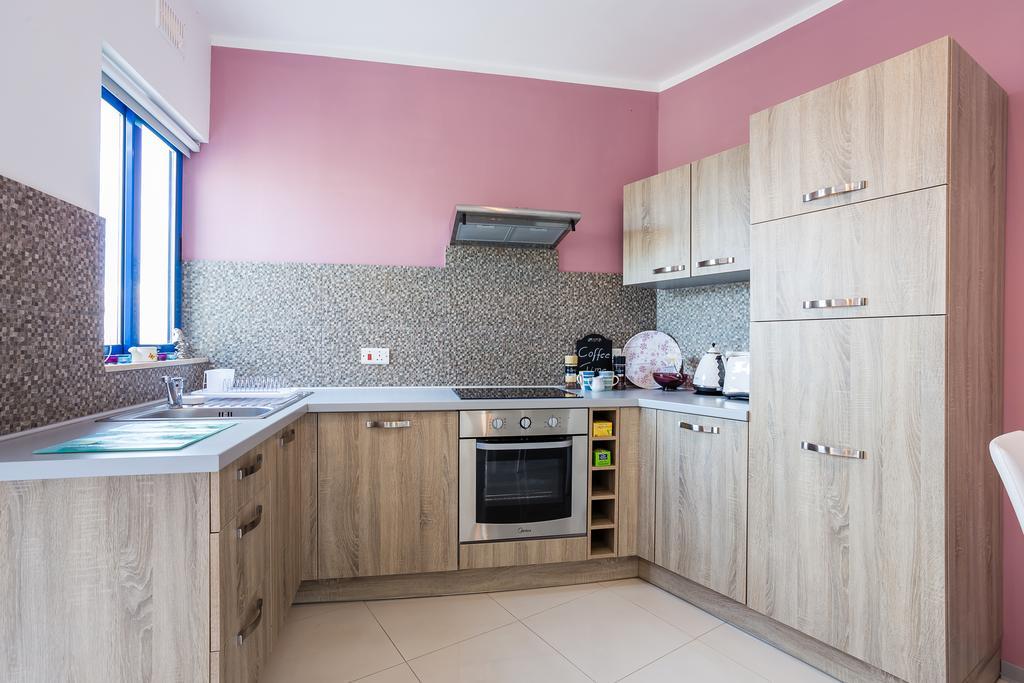 Seaview Luxury Penthouse With Shared Swimming Pool Apartman Għajnsielem Kültér fotó
